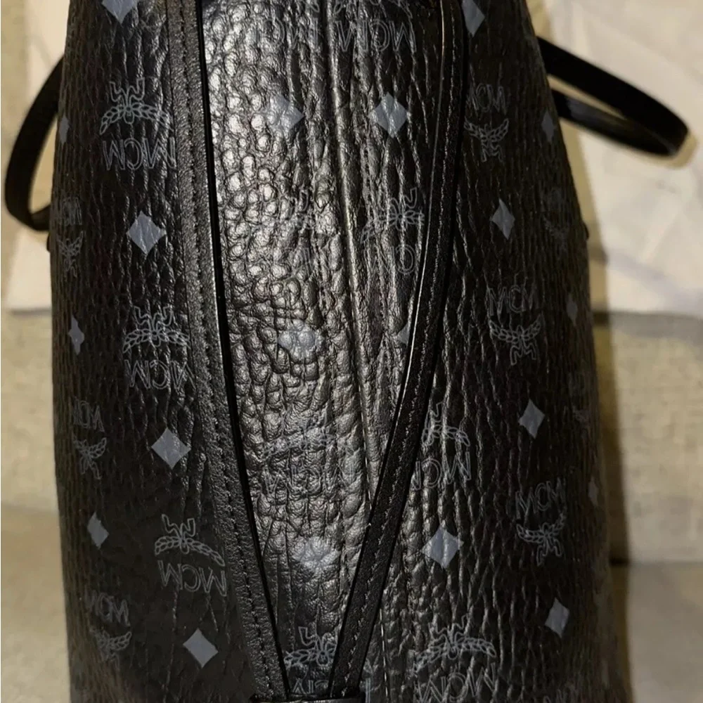Authentic MCM tote with pouch, paperwork, and Tags. Love this Bag!! - Picture 13 of 16